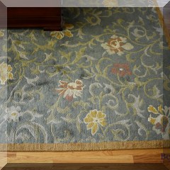 D01. Hand knotted wool Tibetian rug. Green ground with floral design. 10'x14' - $1800